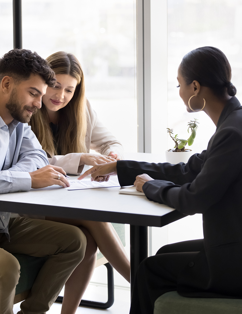 Young couple signing contract, buying company services, or insurance cover